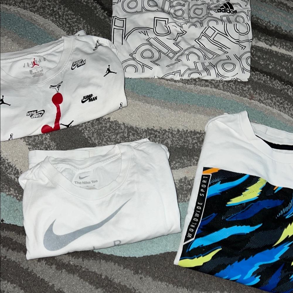 Nike White Graphic Tee Bundle with Blue and Yellow Accents